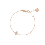 Roberto Coin Princess Flower 18ct rose and white gold diamond bracelet featuring a diamond-set flower with rope detail and signature ruby accent.