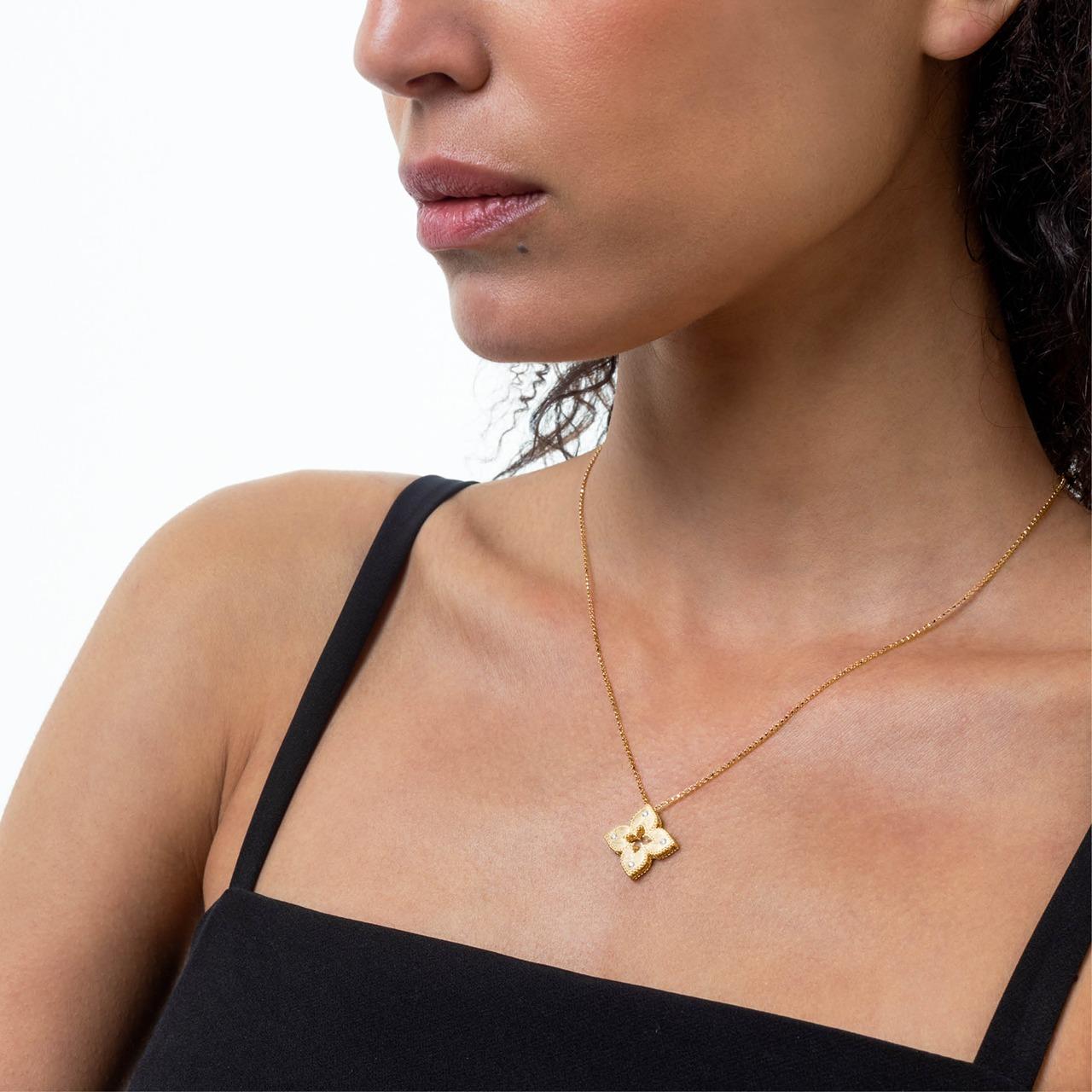 Roberto Coin Venetian Princess diamond necklace in yellow gold with matte flower pendant