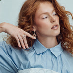 Roberto Coin Venetian Princess ring in 18ct rose gold featuring rhodonite-set flower petals, reversible diamond-set matte petals, and a signature hidden ruby inside the shank.