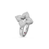 Roberto Coin Venetian Princess ring in 18ct white gold with matte finish, featuring an open flower design with diamond-set petals, rope edge detailing, and a hidden ruby inside the shank.