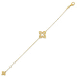 Roberto Coin Venetian Princess 18ct yellow gold diamond bracelet featuring matte open flower motif with rope detail, hanging flower drop, and signature ruby clasp.