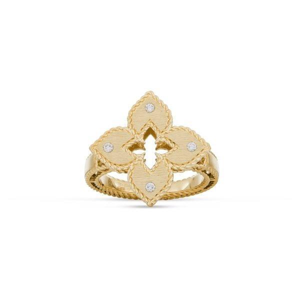 Roberto Coin Venetian Princess ring in 18ct yellow gold with matte finish, featuring an open flower design with diamond-set petals, rope edge detailing, and a hidden ruby inside the shank.