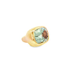 18ct rose gold ring with large bezel-set cushion-cut green quartz in a sculptural puff-top design.