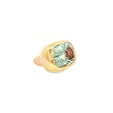 18ct rose gold ring with large bezel-set cushion-cut green quartz in a sculptural puff-top design.