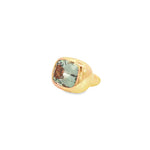 18ct rose gold ring with large bezel-set cushion-cut green quartz in a sculptural puff-top design.