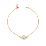 9ct rose gold trace link bracelet with mother of pearl clover centre.