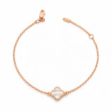 9ct rose gold trace link bracelet with mother of pearl clover centre.