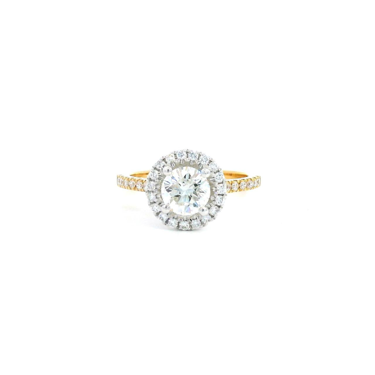 18ct yellow and white gold diamond halo ring featuring a 1.02ct round brilliant cut diamond with a multi-claw halo and diamond-set shoulders.
