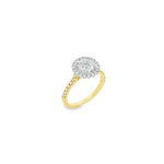 18ct yellow and white gold diamond halo ring featuring a 1.02ct round brilliant cut diamond with a multi-claw halo and diamond-set shoulders.