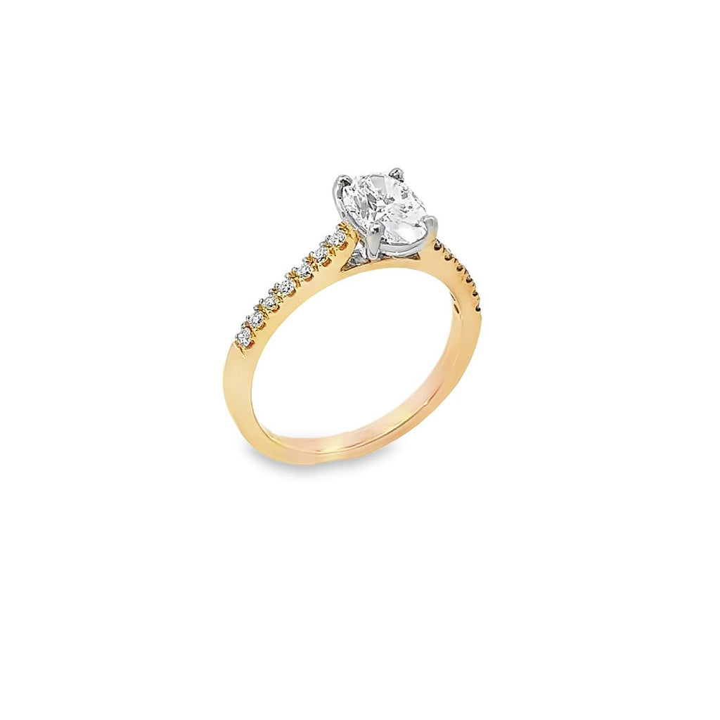 18ct rose and white gold diamond ring featuring a 1.02ct round brilliant cut centre diamond with diamond-set shoulders.