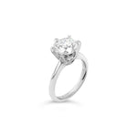 Platinum solitaire diamond ring featuring a 3.01ct round brilliant cut diamond in a six-claw setting.