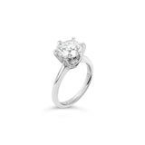 Platinum solitaire diamond ring featuring a 3.01ct round brilliant cut diamond in a six-claw setting.