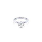 Platinum solitaire diamond ring featuring a 1.06ct round brilliant cut diamond in a six-claw setting.