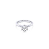Platinum solitaire diamond ring featuring a 1.06ct round brilliant cut diamond in a six-claw setting.