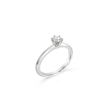 Platinum six-claw solitaire diamond ring featuring a 0.31ct round brilliant cut diamond with a coronet-style cut-out collet.