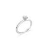 Platinum six-claw solitaire diamond ring featuring a 0.31ct round brilliant cut diamond with a coronet-style cut-out collet.