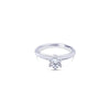 Platinum round brilliant cut 0.50ct solitaire diamond ring with six-claw setting and knife-edge shoulders.