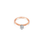18ct rose and white gold solitaire diamond ring featuring a 0.30ct round brilliant cut diamond in a six-claw setting with a coronet-style cut-out collet.