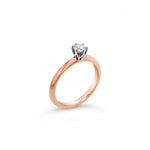18ct rose and white gold solitaire diamond ring featuring a 0.30ct round brilliant cut diamond in a six-claw setting with a coronet-style cut-out collet.