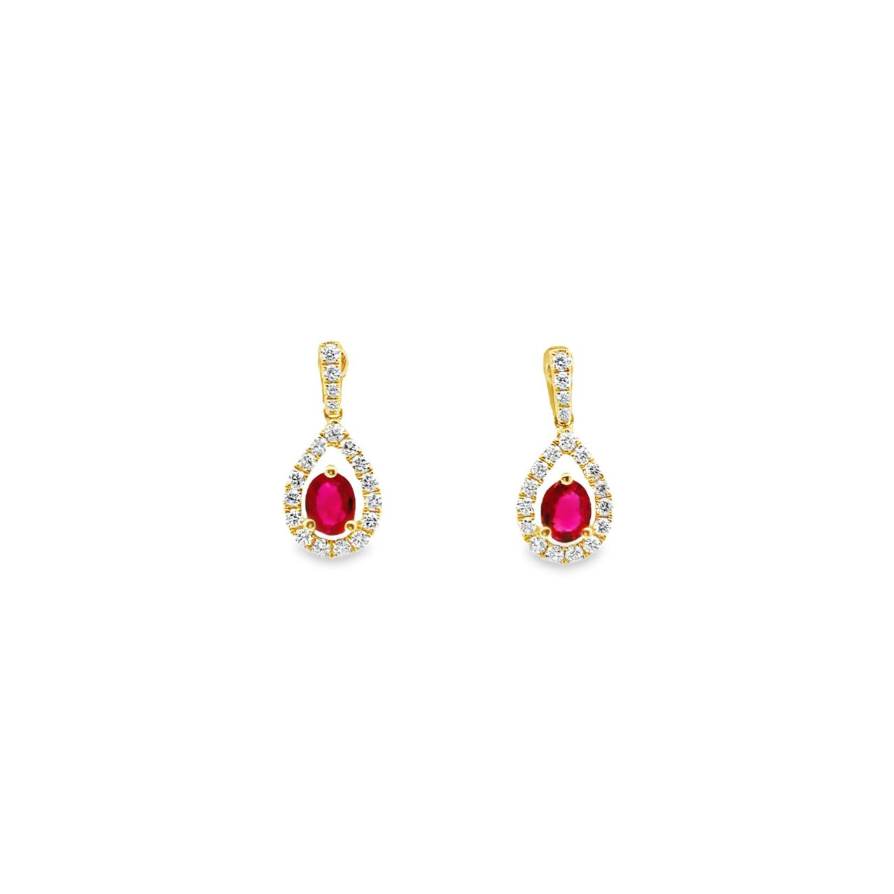 18ct yellow gold earrings featuring oval rubies in three-claw settings with a pear-shaped diamond halo cluster, totalling 0.71ct rubies and 0.44ct diamonds.