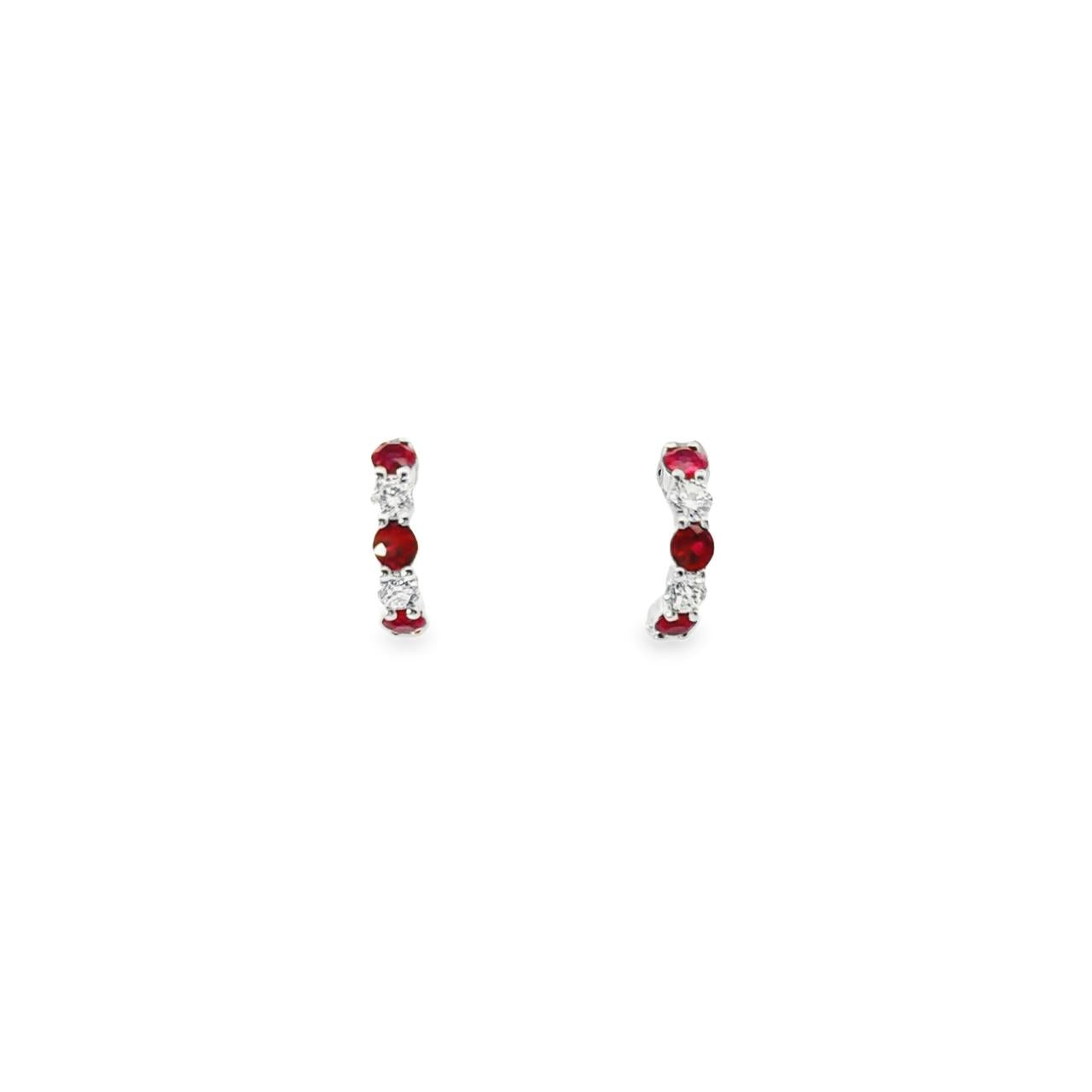 18ct white gold curved bar earrings with alternating claw-set rubies and diamonds, finished with post and butterfly fittings.