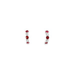 18ct white gold curved bar earrings with alternating claw-set rubies and diamonds, finished with post and butterfly fittings.