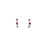 18ct white gold curved bar earrings with alternating claw-set rubies and diamonds, finished with post and butterfly fittings.