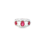 18ct white gold five-stone ring featuring alternating oval rubies and diamonds with multi-claw halo surround and cut-out undercarriage.