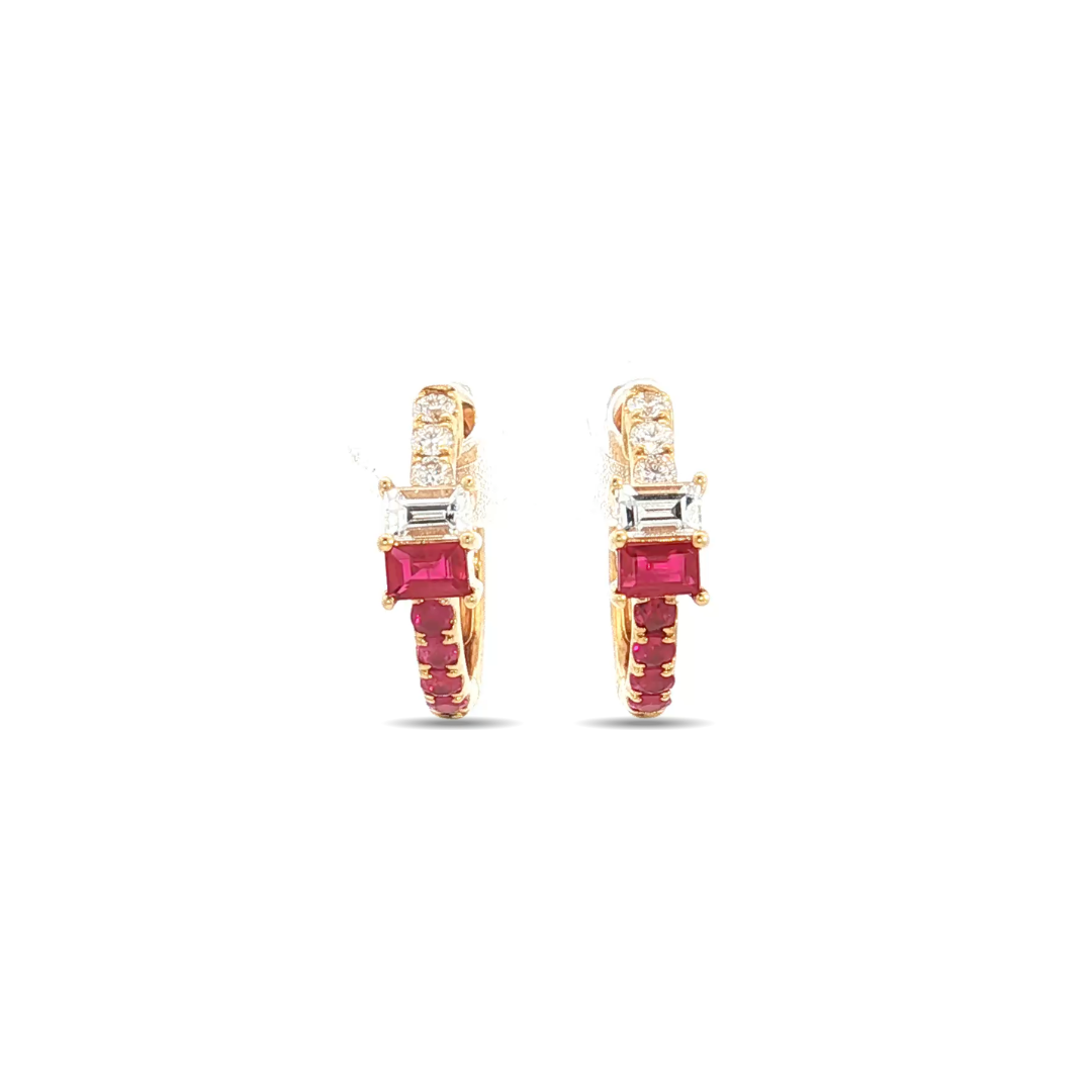 18ct yellow gold huggie earrings with emerald-cut ruby and diamond set horizontally, rubies extending to the bottom and diamonds to the top, hinged with clip catch.