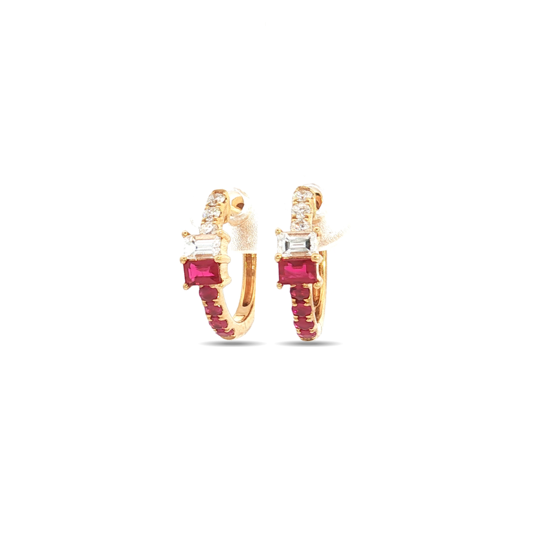 18ct yellow gold huggie earrings with emerald-cut ruby and diamond set horizontally, rubies extending to the bottom and diamonds to the top, hinged with clip catch.