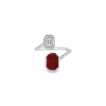 18ct white gold ruby and diamond crossover ring featuring octagonal invisible cluster settings with baguette, emerald, and trapezoid cut stones.
