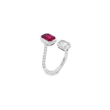 18ct white gold ruby and diamond crossover ring featuring octagonal invisible cluster settings with baguette, emerald, and trapezoid cut stones.