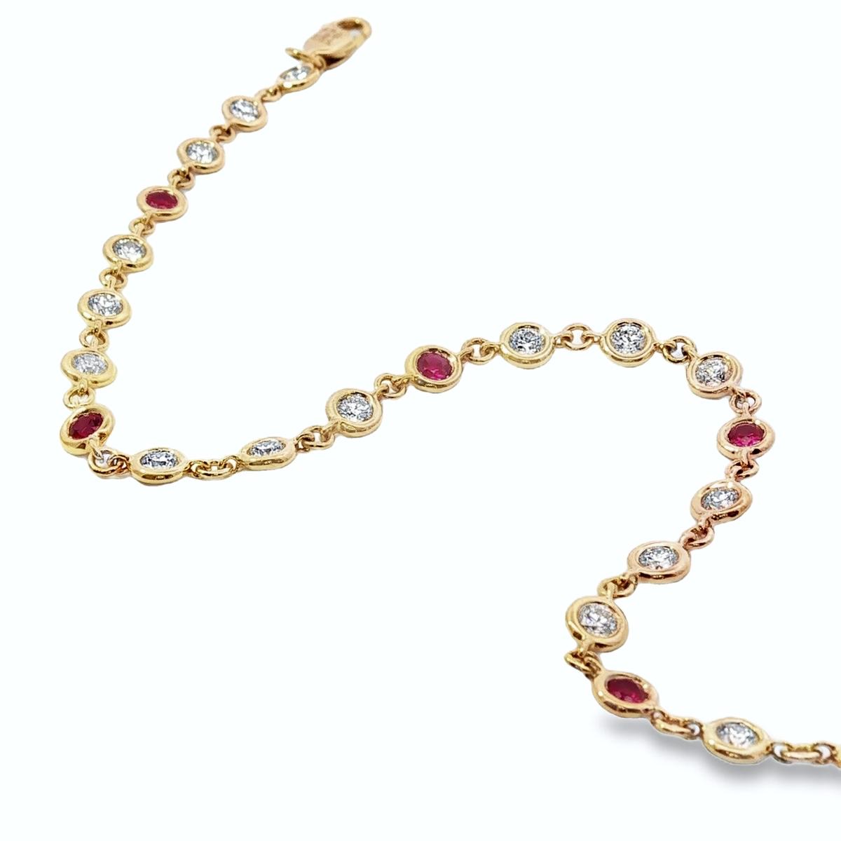 18ct yellow gold bracelet with bezel set diamonds and rubies in repeating pattern