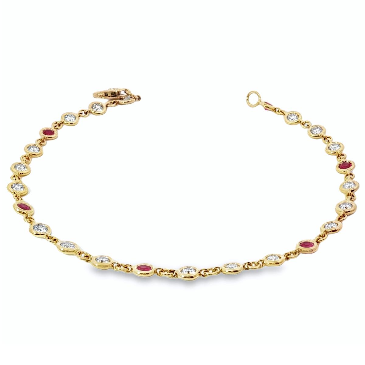 18ct yellow gold bracelet with bezel set diamonds and rubies in repeating pattern