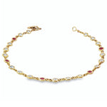18ct yellow gold bracelet with bezel set diamonds and rubies in repeating pattern