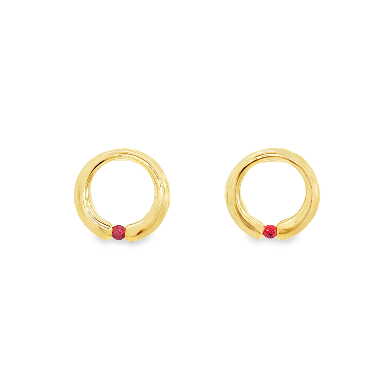 9ct yellow gold open circle stud earrings featuring single round rubies at the base.