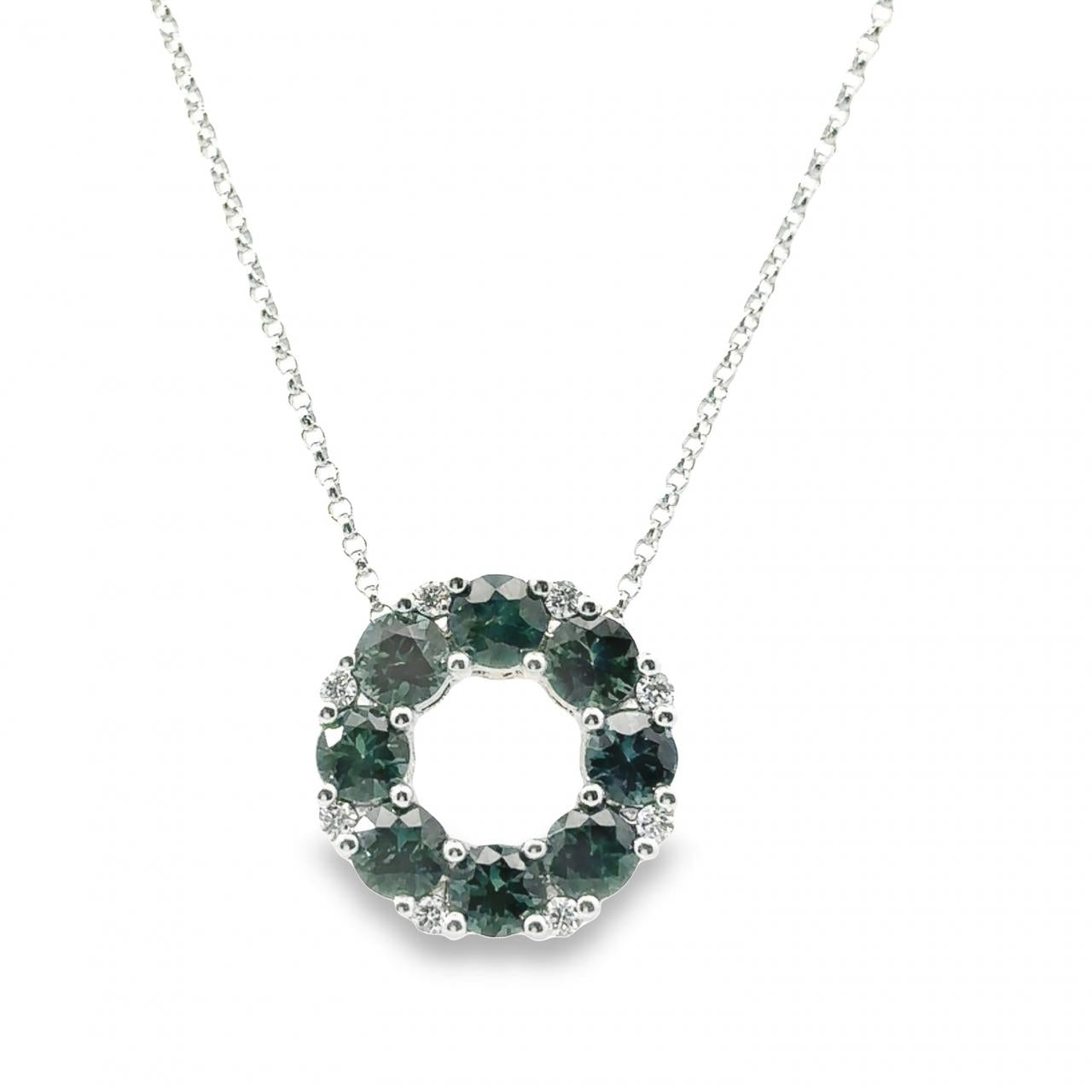 18ct white gold circle necklet featuring alternating teal blue-green sapphires and diamonds in claw settings, suspended on a fine 45cm belcher link chain.