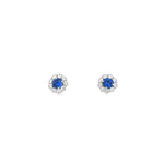 18ct white gold sapphire and diamond stud earrings featuring round centre sapphires surrounded by diamond halos, with post and butterfly fittings.