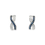 18ct white gold sapphire and diamond earrings featuring a curved “X”-shaped crossover front with alternating sapphire and diamond rows.