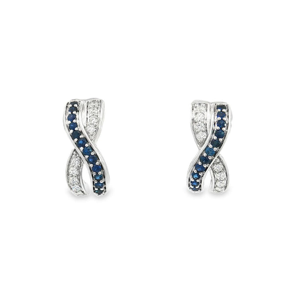 18ct white gold sapphire and diamond earrings featuring a curved “X”-shaped crossover front with alternating sapphire and diamond rows.