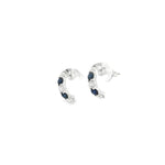 18ct white gold curved bar earrings featuring alternating claw-set sapphires and diamonds, with post and butterfly fittings.