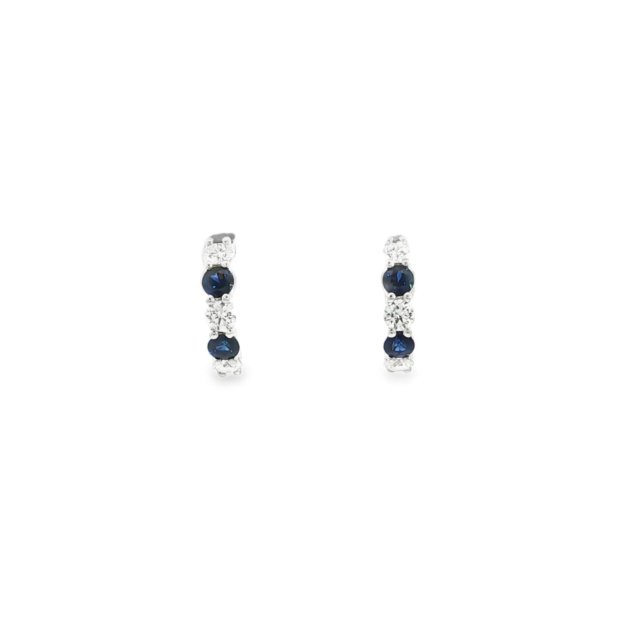 18ct white gold curved bar earrings featuring alternating claw-set sapphires and diamonds, with post and butterfly fittings.