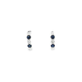 18ct white gold curved bar earrings featuring alternating claw-set sapphires and diamonds, with post and butterfly fittings.