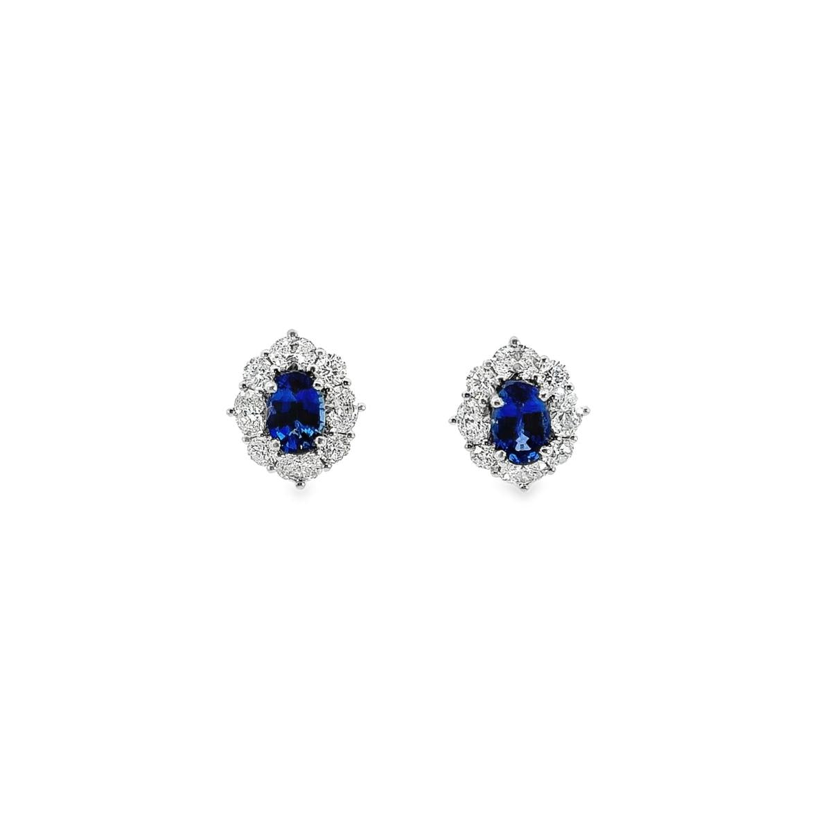 18ct white gold sapphire and diamond stud earrings with oval centre sapphires surrounded by alternating sapphires and diamonds in a cluster design, post and butterfly fittings.