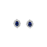 18ct white gold sapphire and diamond stud earrings with oval centre sapphires surrounded by alternating sapphires and diamonds in a cluster design, post and butterfly fittings.