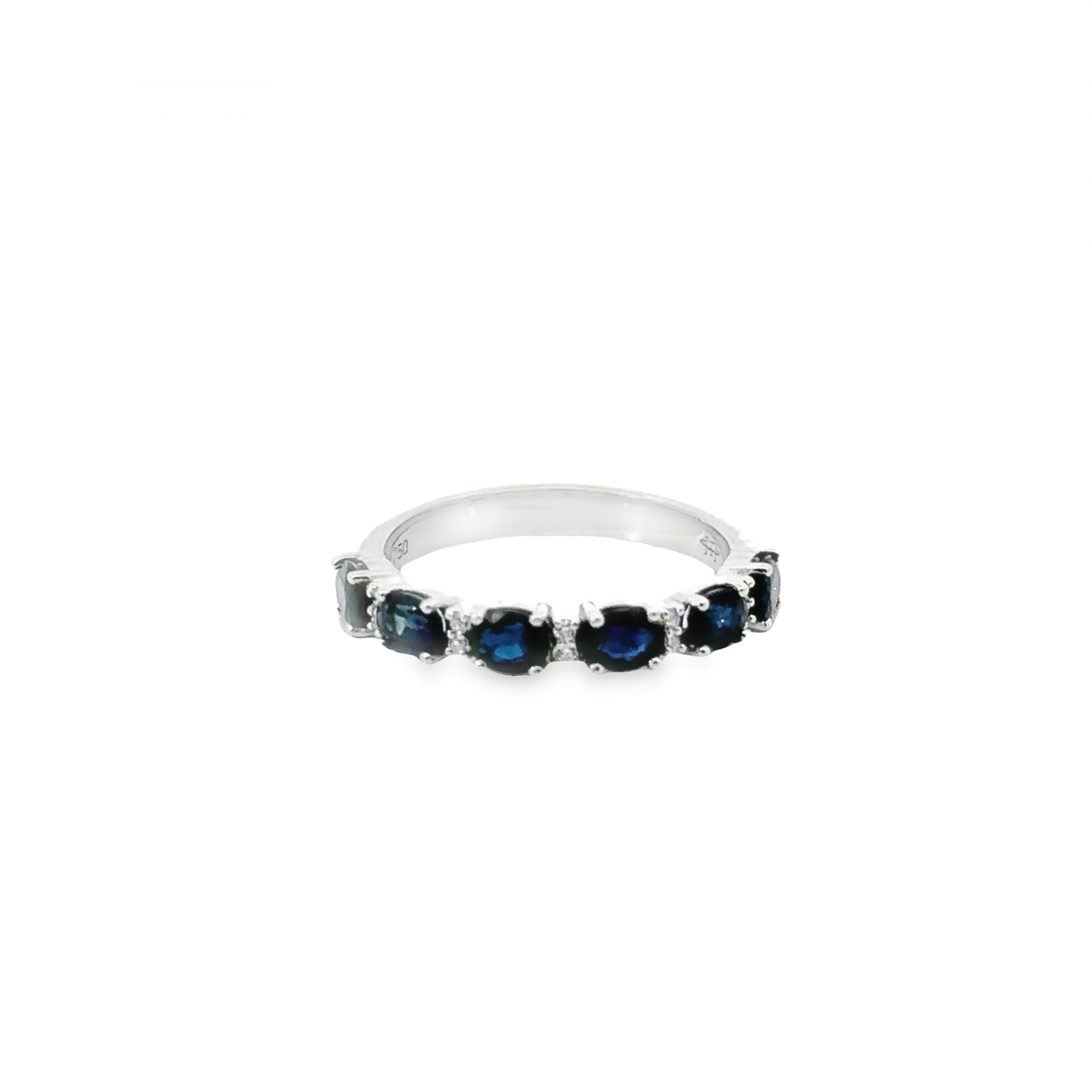18ct white gold ring featuring six oval cut blue sapphires and ten round brilliant cut diamonds in alternating claw-set horizontal design.