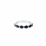 18ct white gold ring featuring six oval cut blue sapphires and ten round brilliant cut diamonds in alternating claw-set horizontal design.