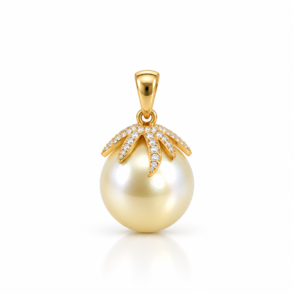18ct yellow gold South Sea pearl and diamond pendant featuring a 14mm light golden pearl with a sculptural pavé diamond-set cap.