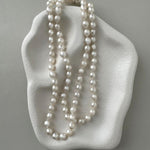 long South Sea pearl strand necklace with silver white oval pearls and sterling silver clasp