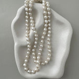 long South Sea pearl strand necklace with silver white oval pearls and sterling silver clasp